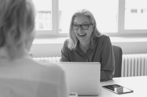 A manager asks telemarketer interview questions.