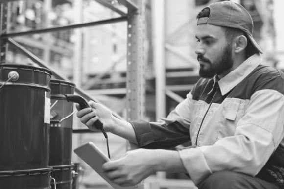 Material handler working in a warehouse area