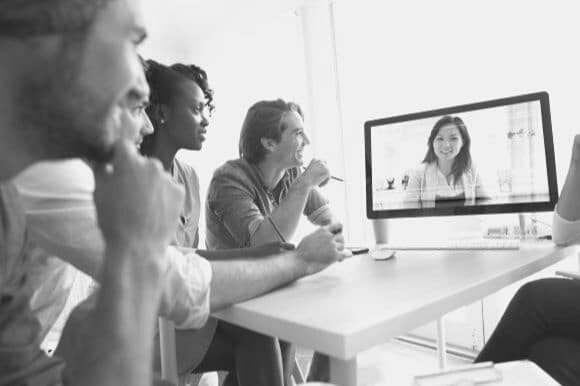 Company conference call in office with international employees