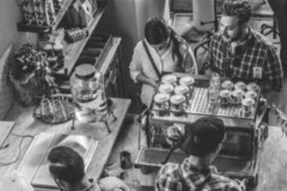 Fast food workers help customers.